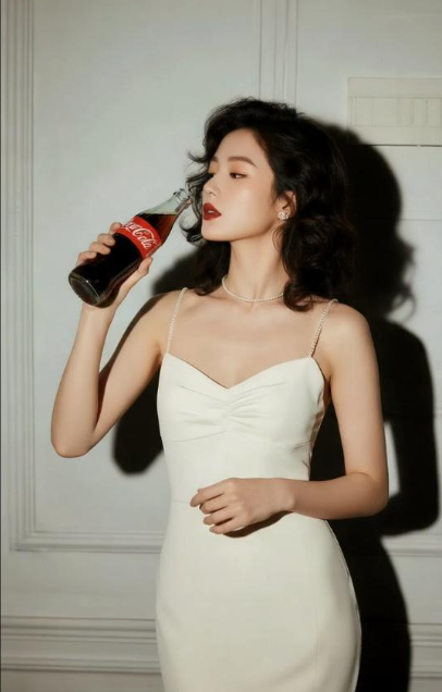 the model happily picks up the cola and takes a sip. generated by nano banana